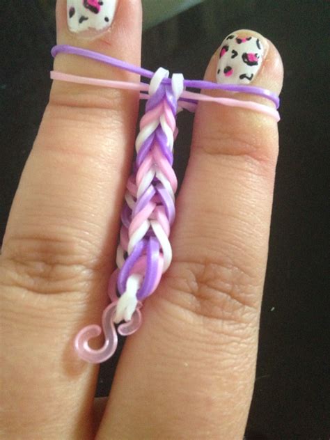 Finger loom bracelets - How to Make a Snake Belly. By LoomLove on June 15, 2014. The Snake Belly is not for the faint of heart. In fact, it’s known as one of the most complicated Rainbow Loom bracelet designs. But look at how drop dead beautiful it is: